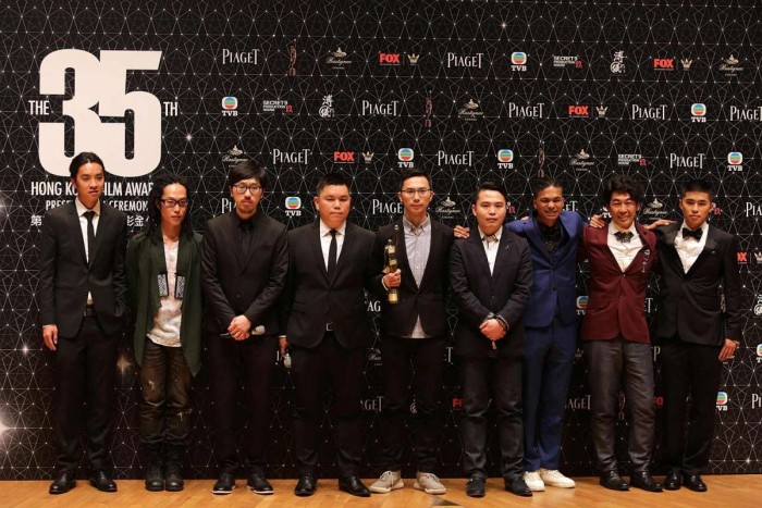 The cast and crew of 10 Years after winning Best Film at the Hong Kong Film Awards PHOTO: AFP